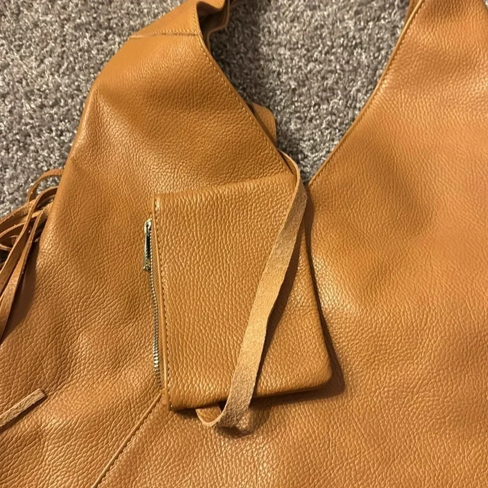 Genuine leather fringe leather hobo bag from Italy